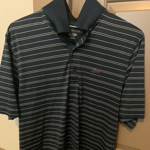 Greg Norman Golf shirt, moderate use.